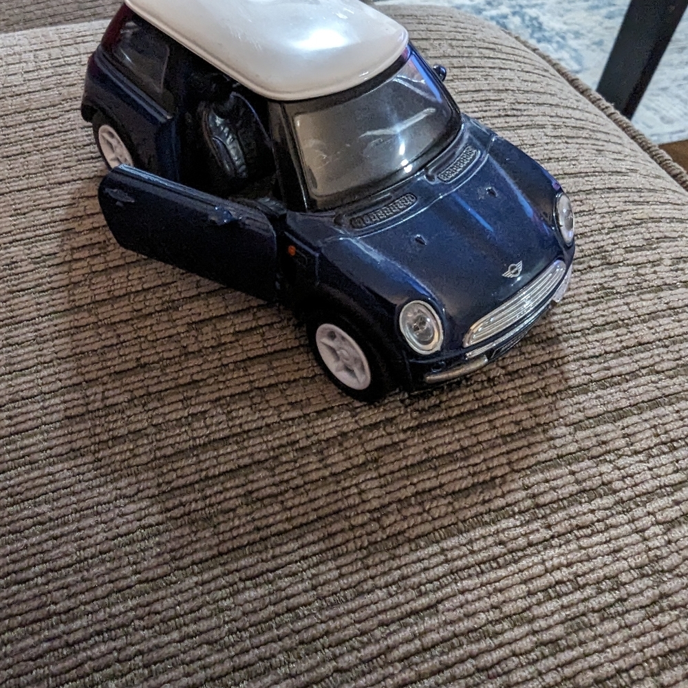 Die Cast Mini Copper. Made in China. Doors open and close.